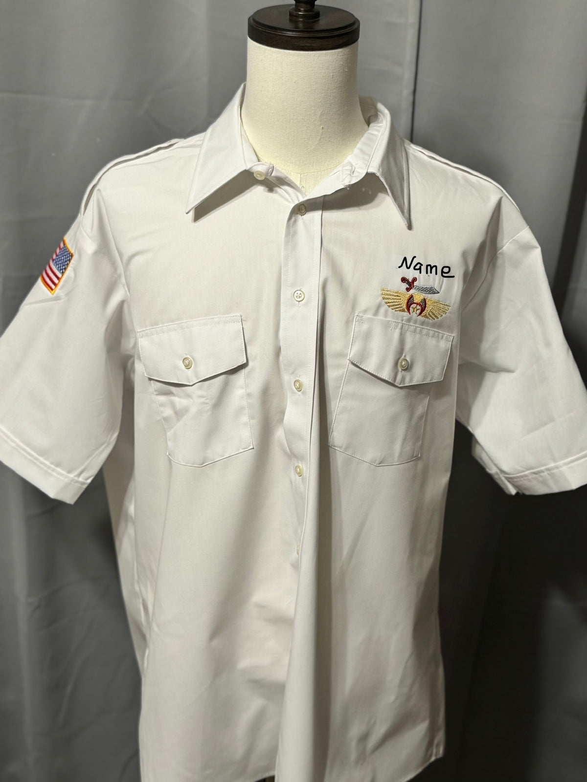 a white shirt with a name on it