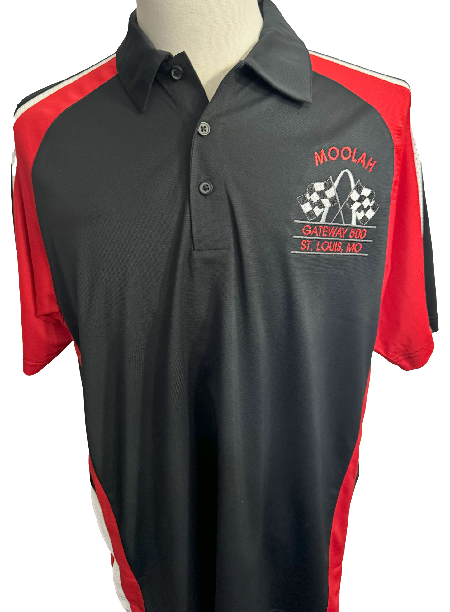Black and red polo shirt with a logo on a mannequin against a white background