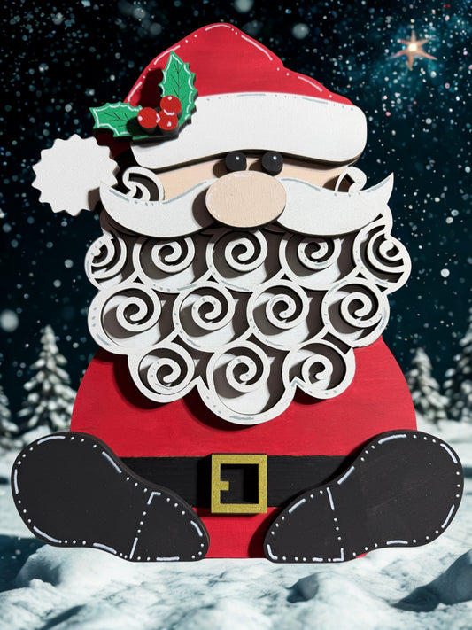 Wooden Christmas decoration of a Santa Claus figure with a detailed beard against a snowy background.