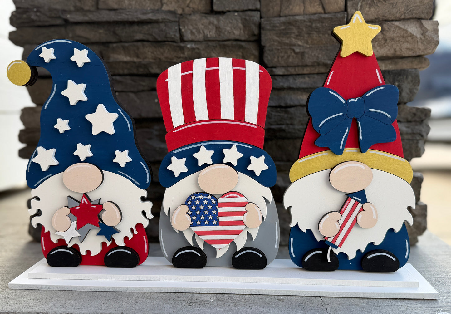 a group of gnomes on a shelf