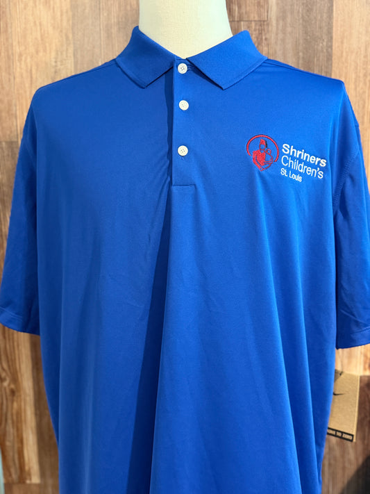 a blue polo shirt on a mannequin