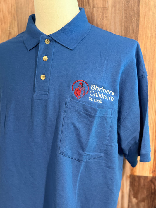 a blue polo shirt with a logo on it