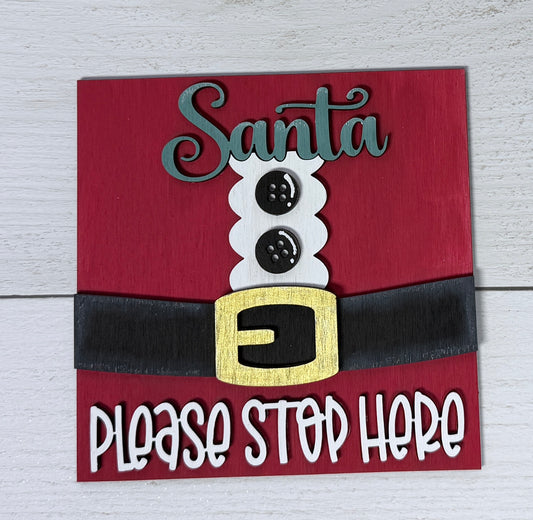 a sign with a belt and buttons on it