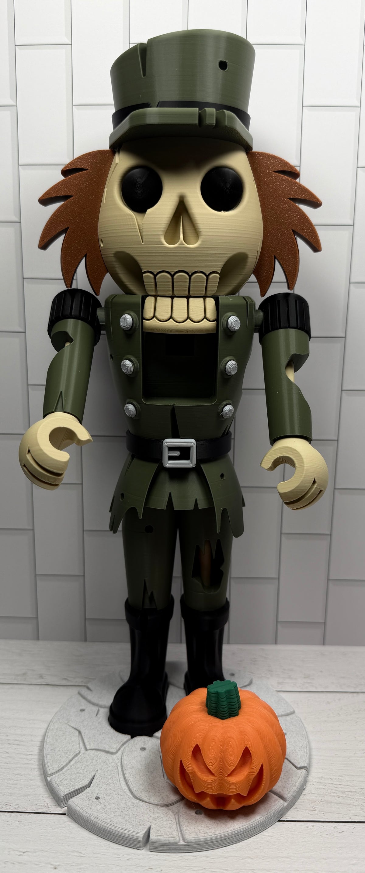a toy figure in front of a white tile wall