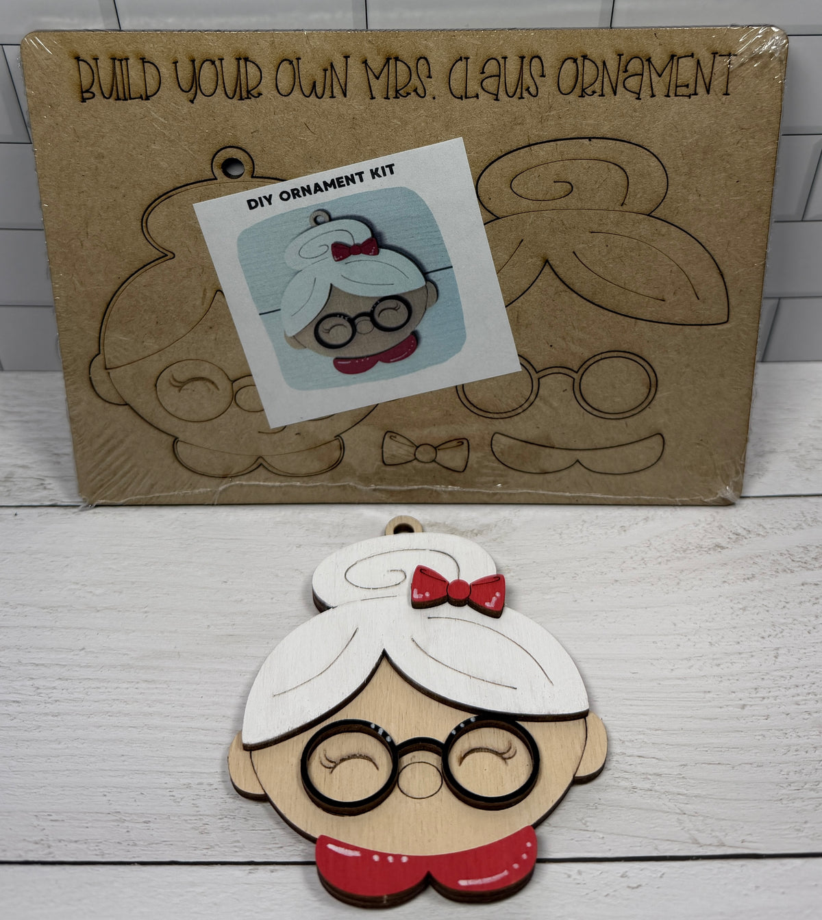 a wooden ornament next to a box