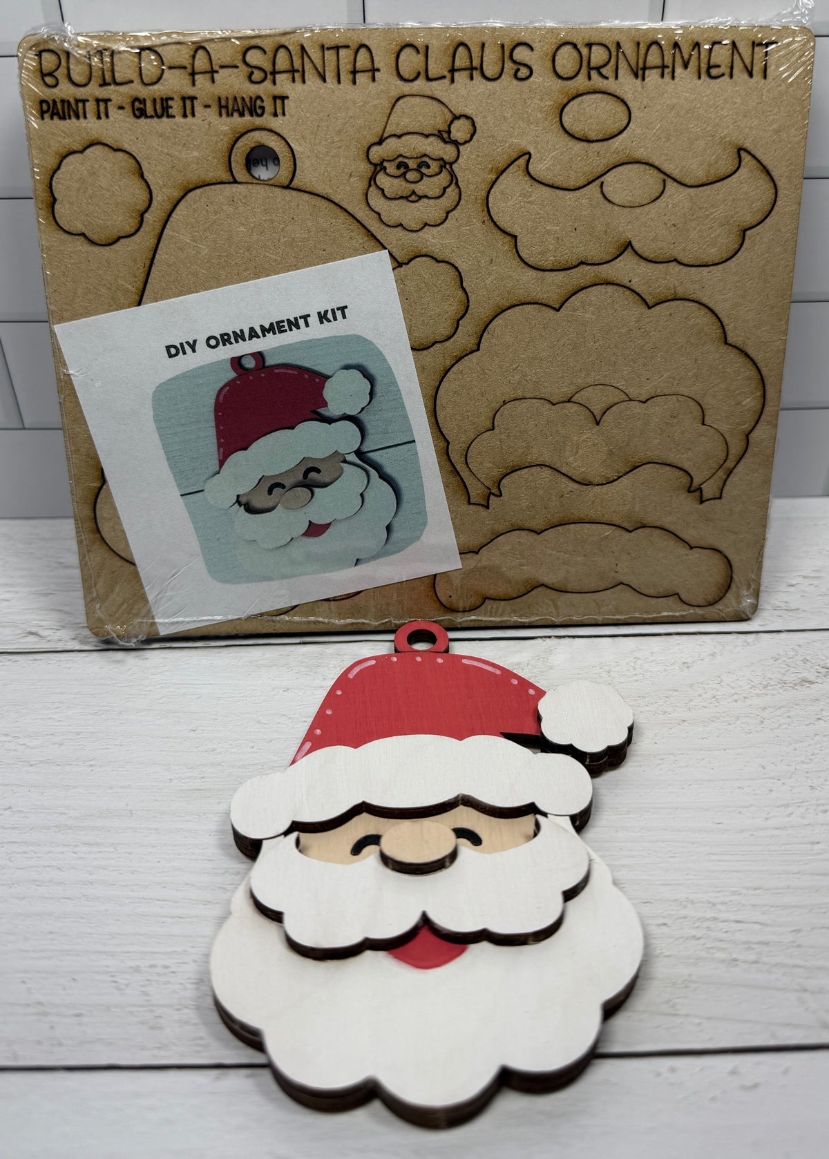 a santa claus ornament and a cardboard box