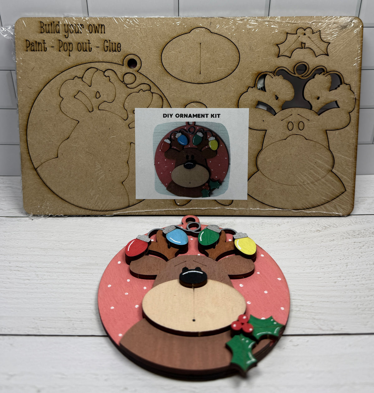 a christmas ornament kit with a reindeer