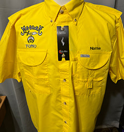 a yellow shirt with a black tag